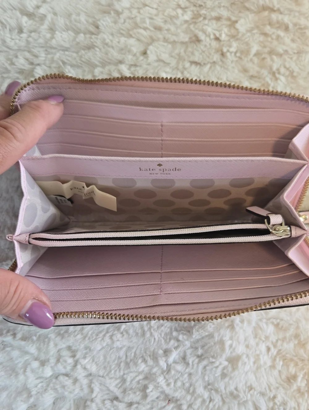 kate spade pale pink zip-around wallet with gold logo EUC